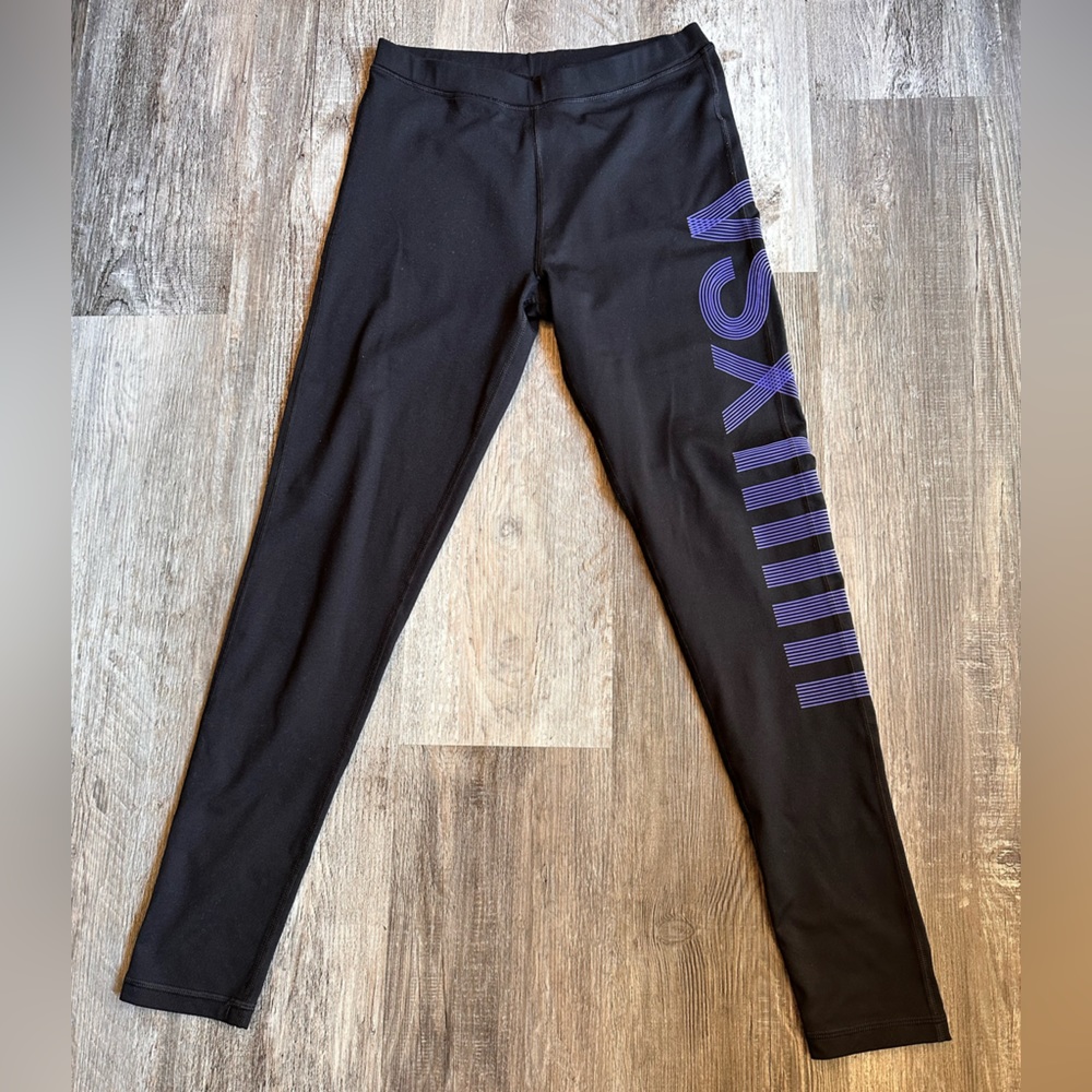VS Secret black leggings with purple embossed logo